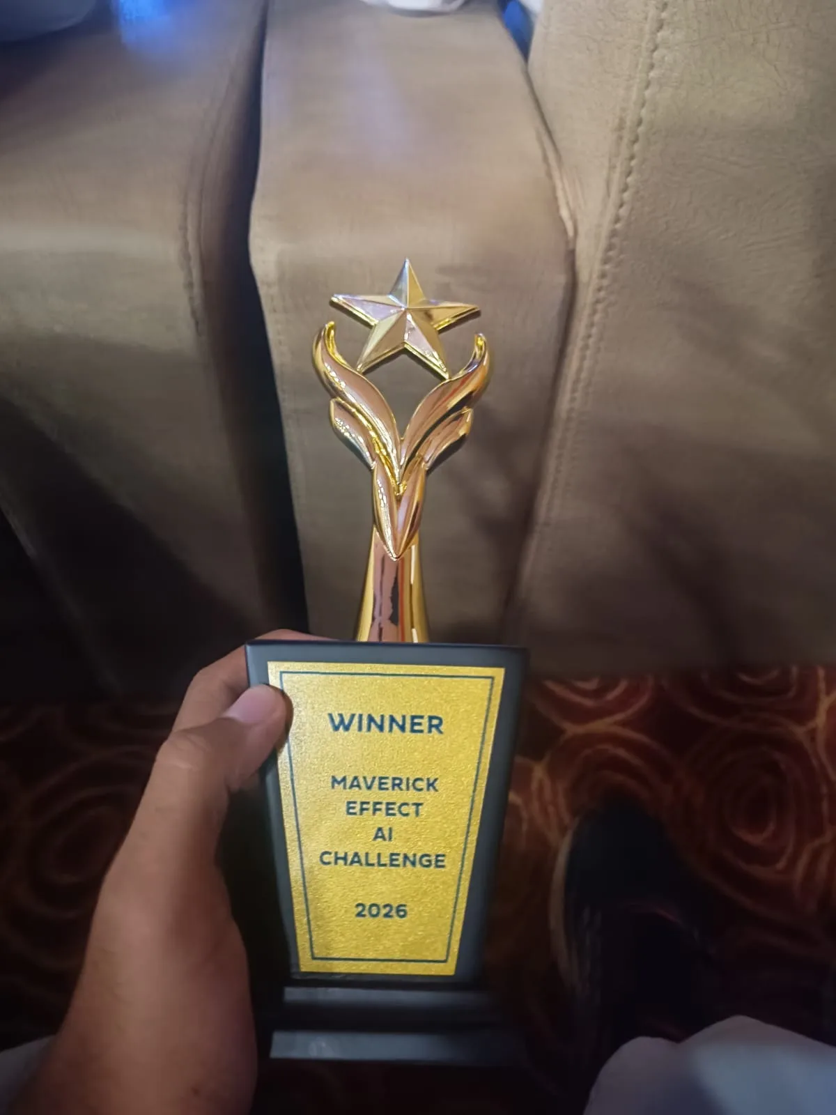 Winner's trophy from The Maverick Effect AI Challenge 2026